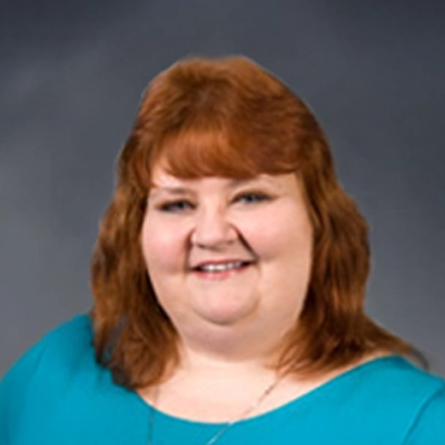 Insurance Coordinator Lisa Panzone-Gish Smiling