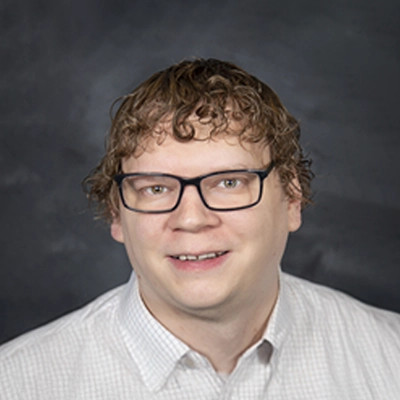 Insurance Coordinator Michael Thomas Smiling